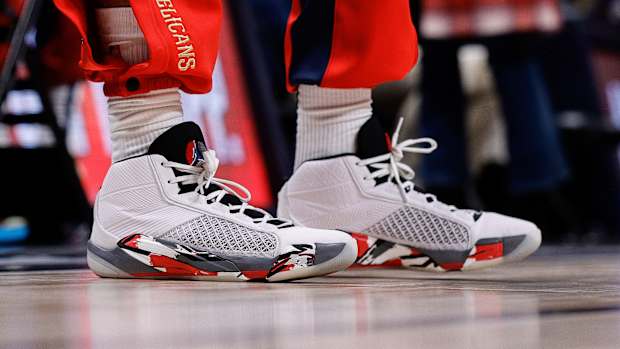 New Orleans Pelicans forward Brandon Ingram's white and black Air Jordan sneakers.